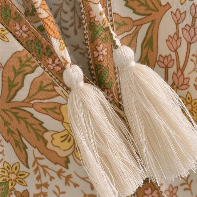 Boho-blouse - Losvallende damesblouse met knopen en lange mouwen met bloemenprint-Boetiek Moda