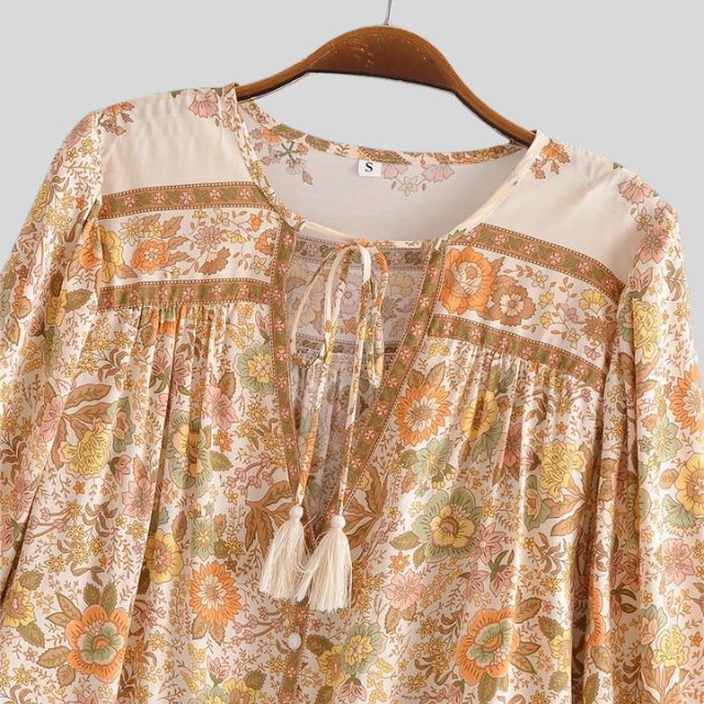 Boho-blouse - Losvallende damesblouse met knopen en lange mouwen met bloemenprint-Boetiek Moda