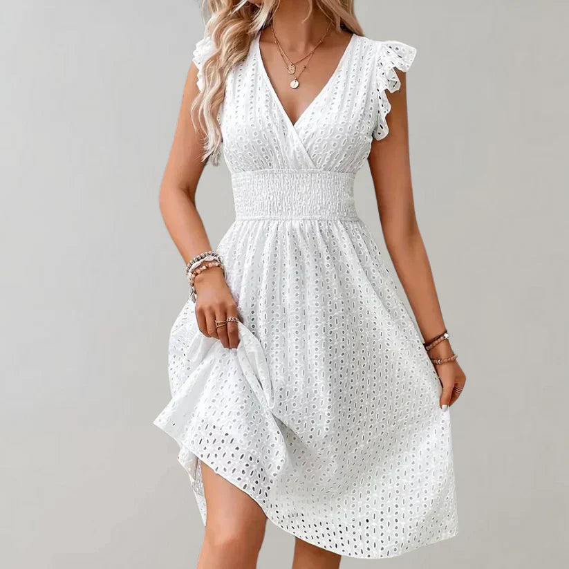Witte jurk | V-hals | Mouwloos | Oogjesjurk | Zomerjurk-Boetiek Moda